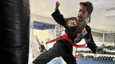 Children practicing martial arts in Los Alamitos